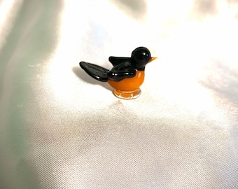 Tiny glass robin