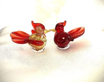 miniature male and female cardinal