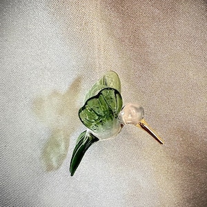 Tiny hanging hummingbird