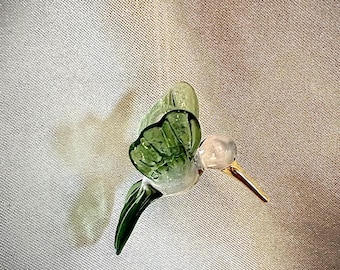 Tiny hanging hummingbird