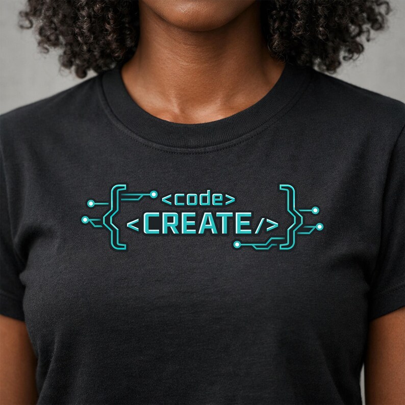 May include: Black t-shirt with a teal and white graphic that reads "<code>CREATE/</code>". The design features a circuit board-style bracket and text, perfect for programmers and tech enthusiasts.