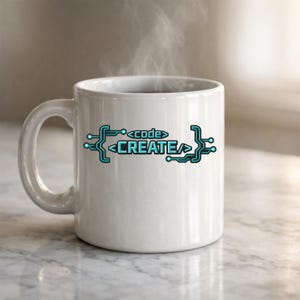 May include: White ceramic mug with the words "<code>CREATE</code>" in a teal circuit board design. Steam rises from the top of the mug, suggesting a hot beverage. The mug has a curved handle and sits on a marble surface.