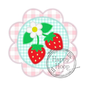 May include: Embroidered design of two red strawberries with green leaves and a white flower on a light blue and white gingham background. The design is surrounded by a pink and white gingham border. The text "Happy Hoop Established 2022 Embroidery Designs" is in a circle around the strawberries.