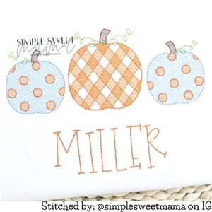 May include: Three embroidered pumpkins with a checkered, polka dot, and polka dot design. The pumpkins are in a row with the name "MILLER" stitched below them.