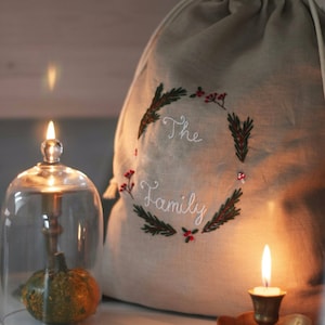 Christmas Drawstring Linen Sack With Hand Embroidered Family name/ Reusable Embroidered Linen Pouch / Christmas gifts sack