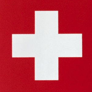May include: A white cross on a red background. This is the flag of Switzerland.