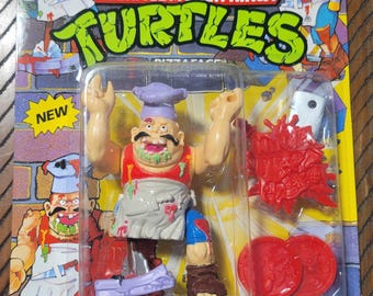 1990 TMNT Pizza Face Unpainted knife and sauce on hat Variant Vintage Teenage Mutant Ninja Turtles Action Figure New Old Stock Unpunched