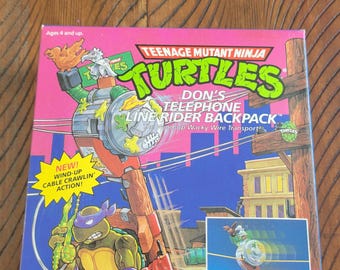 Mochila TMNT Don's Telephone Line Rider de 1989, lacrada de fábrica.
