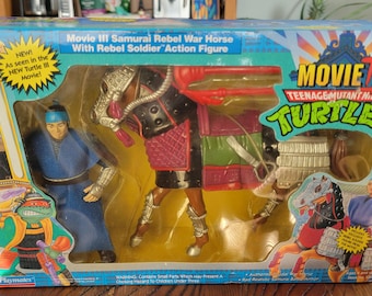 Figura de ação do Cavalo de Guerra Rebelde do filme Tartarugas Ninja III de 1992, na caixa.