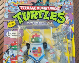 Figura de ação vintage das Tartarugas Ninja, Raph, o Cadete Espacial, de 1990, lacrada e sem uso.