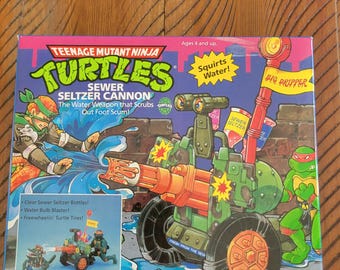 Conjunto de brinquedo vintage TMNT Sewer Seltzer Cannon de 1990 - Raro, na caixa.