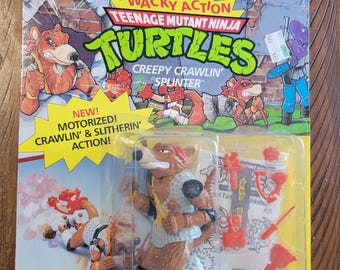 Figura de ação vintage das Tartarugas Ninja, modelo Splinter Creepy Crawlin', de 1990.