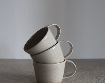 Handmade White Stoneware Coffee Cup: Artisan Ceramic Mug