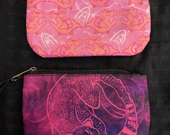Monederos de guepardos celestiales y tiburones preciosos