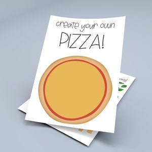 May include: A printable pizza craft activity for kids. The image shows a white card with the text "create your own PIZZA!" and a yellow pizza with red sauce.