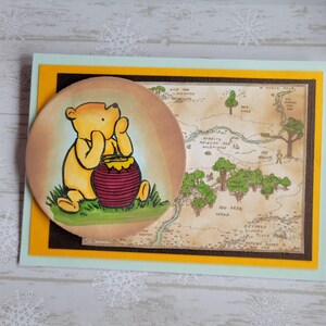 Oso Pooh con mapa