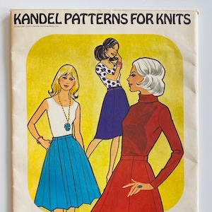 May include: A vintage knitting pattern booklet for gored skirts. The cover features three women wearing different styles of skirts. The pattern is for sizes 6 to 20 and costs $1.25. The text on the cover reads "Kandel Patterns for Knits" and "Pattern 60".