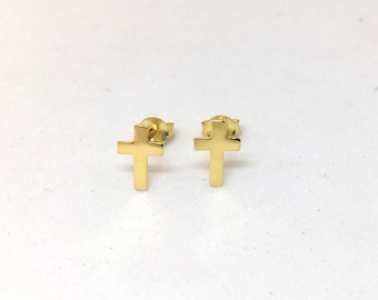 A pair of yellow gold plated silver religious cross studs earrings