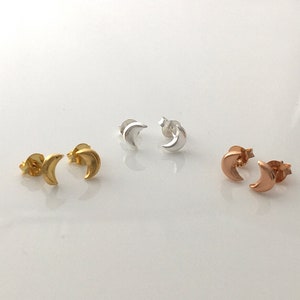 A pair of small Crescent Moon sterling silver, yellow gold or rose gold plated silver stud earrings, celestial earrings
