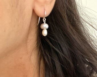 A pair of mushroom natural pearl sterling silver dangle earrings