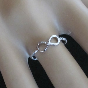 Infinity eternity love rhodium plated sterling silver ring, size 7 US ring