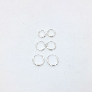 A pair of small laser cut 8mm, 10mm or 12mm sterling silver hoops sleepers