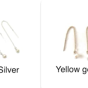 May include: Two pairs of pearl drop earrings, one pair in silver and one pair in yellow gold.