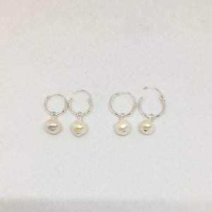 A pair of white natural pearl charms sterling silver sleepers hoops, kids, girls earrings