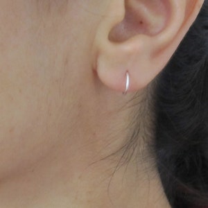 A pair of 20g wire hoop sleepers in sterling silver, 14k yellow and rose gold filled small earrings, nose rings