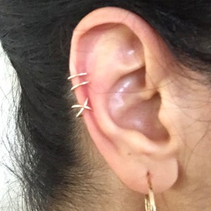 A set of a double and a criss cross ear cuffs, fake cuffs, no piercing cuffs in sterling silver, 14K yellow and rose gold filled