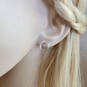 A pair of Crescent Moon horn sterling silver stud earrings, celestial earrings