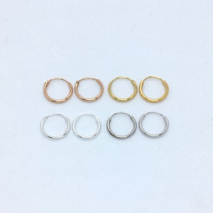 A pair of 12mm sterling silver or yellow gold or rose gold plated sterling silver hoops