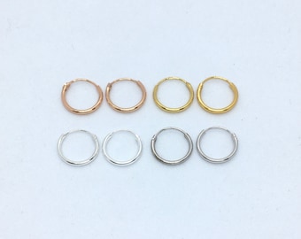 A pair of 12mm sterling silver or yellow gold or rose gold plated sterling silver hoops