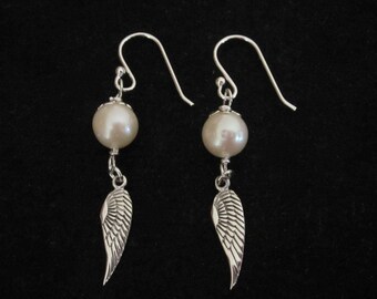 A pair of wings with natural pearls sterling silver dangle drop earrings