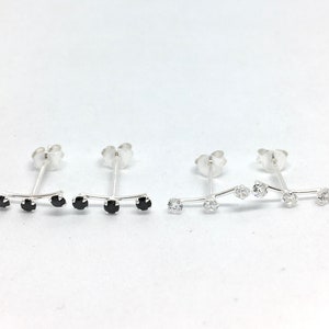 A pair of three cz stones sterling silver stud earrings, minimal studs