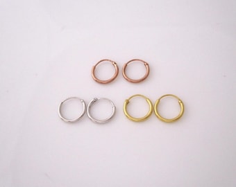 A pair of small 10mm sleepers in sterling silver, yellow gold or rose gold plated silver small hoops