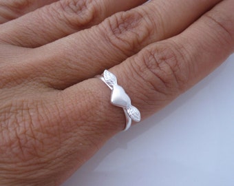 Winged heart sterling silver ring, size  7 3/4 US ring