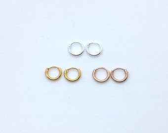 A pair of tiny 8mm sleepers in sterling silver, yellow gold or rose gold plated silver small hoops