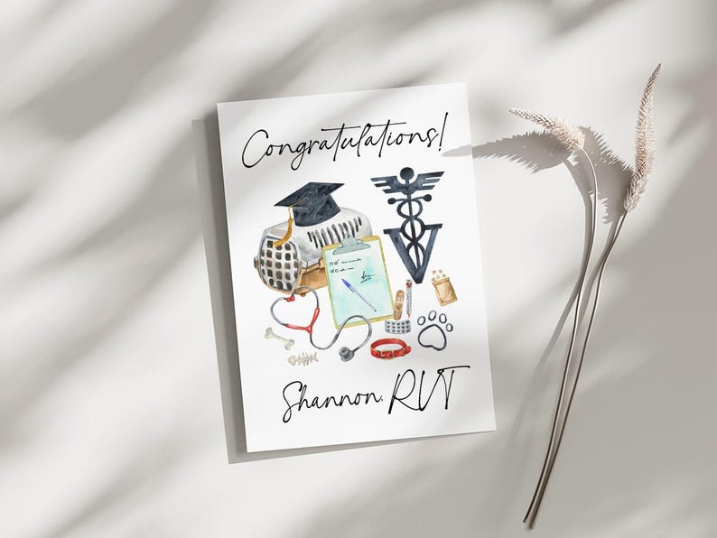 May include: Congratulations card with a watercolor illustration of a graduation cap, a pet carrier, a stethoscope, a clipboard, a bone, a paw print, and a veterinary symbol. The text "Congratulations!" and "Shannon RVT" is written on the card.