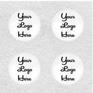 May include: Four white round stickers with black text that says "Your Logo Here" on each sticker.