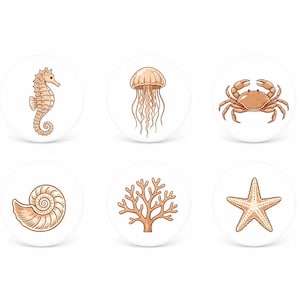 May include: Six round white buttons with sea creature illustrations. The designs include a seahorse, jellyfish, crab, seashell, coral, and starfish, all in shades of brown and tan.