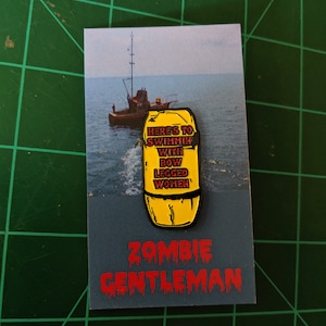 Jaws &quot;Here&#39;s to swimmin&#39; with bow legged women&quot; enamel pin