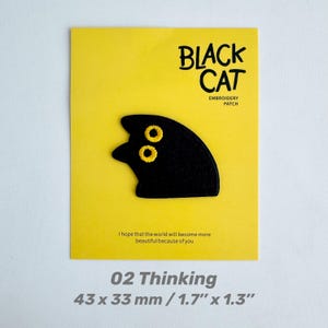 May include: A black cat embroidery patch with yellow eyes, on a yellow card. The card reads "BLACK CAT EMBROIDERY PATCH" and "02 Thinking". The patch measures 1.7" x 1.3". The card also includes the text "I hope that the world will become more beautiful because of you."