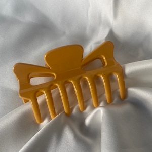 Orange claw hair clip