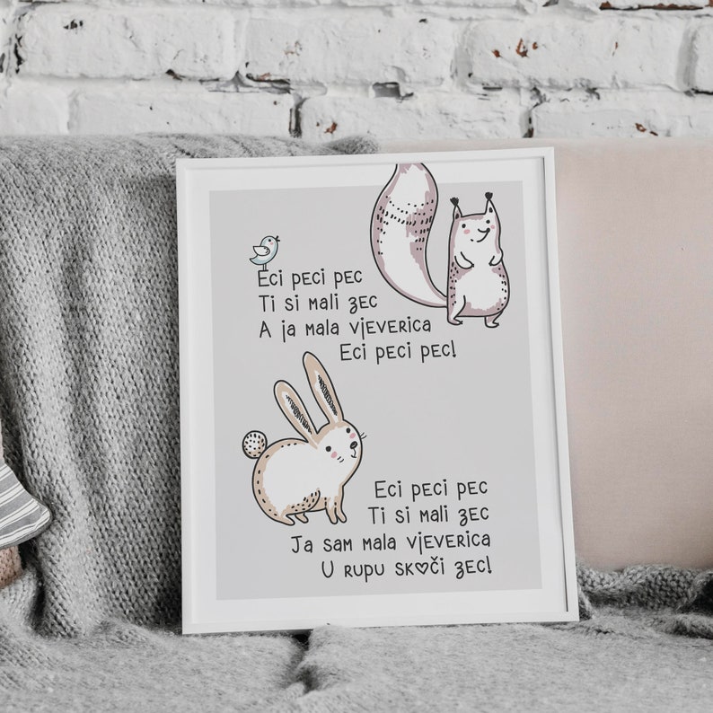 May include: A framed print featuring a whimsical illustration of a bunny and a squirrel. The artwork includes text in a playful font. The color palette is soft, with shades of gray, white, and brown, creating a gentle and inviting aesthetic.