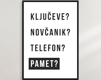 May include: Black and white printable wall art with the text "KLJUČEVE? NOVČANIK? TELEFON? PAMET?" in a bold, sans-serif font.