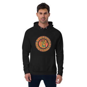 May include: Black hooded sweatshirt with a circular design featuring a person in a headdress surrounded by symbols. The design is in shades of orange, yellow, blue, and green.