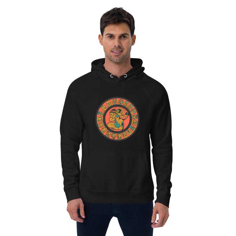 May include: Black hooded sweatshirt with a circular design featuring a person in a headdress surrounded by symbols. The design is in shades of orange, yellow, blue, and green.