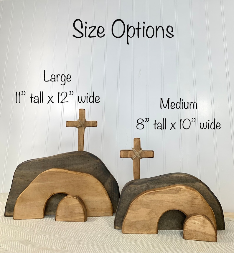 May include: Two wooden Easter tomb decorations, one large and one medium. The large tomb is 11 inches tall and 12 inches wide. The medium tomb is 8 inches tall and 10 inches wide. Both tombs have a wooden cross on top and a small opening at the bottom.