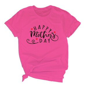 May include: Pink t-shirt with the text "Happy Mother's Day" in black script with red hearts.